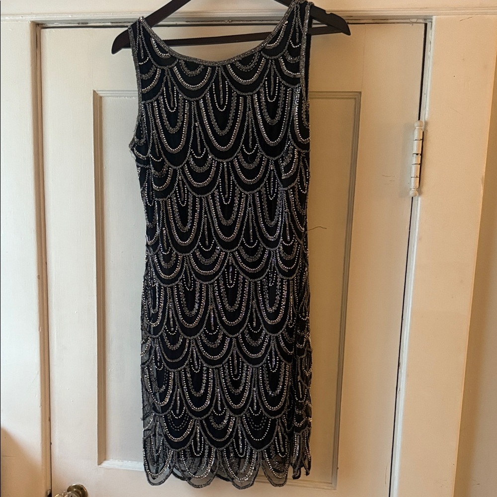 Black with silver stitched in beads, armless  dress